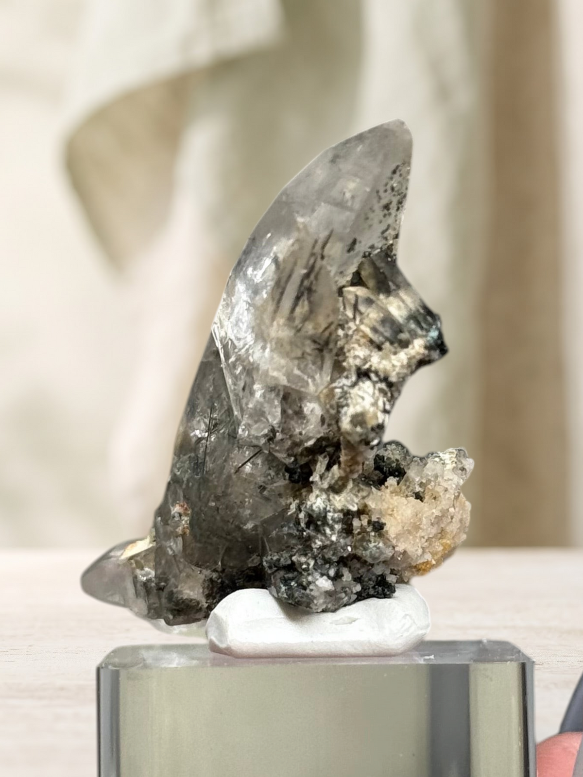 Crystal Glade natural laser quartz specimen from Balochistan, Pakistan, featuring a slender, tapering crystal point.