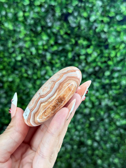 Pink Crazy Lace Agate Palmstone Crystal Carving from Indonesia