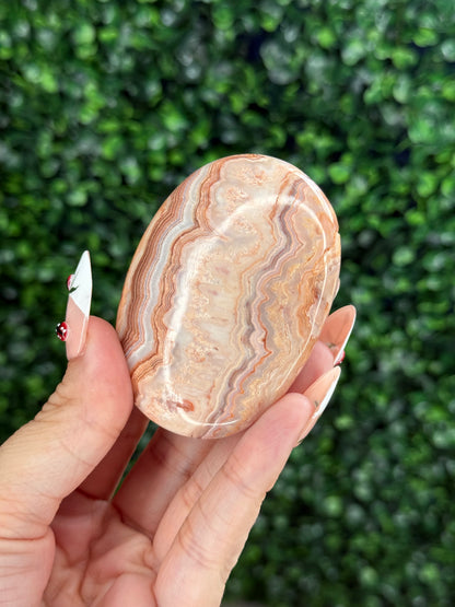 Pink Crazy Lace Agate Palmstone Crystal Carving from Indonesia