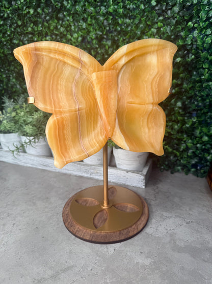 Calcite Butterfly Crystal Carving: Honey Orange Gemstone with Golden Stand