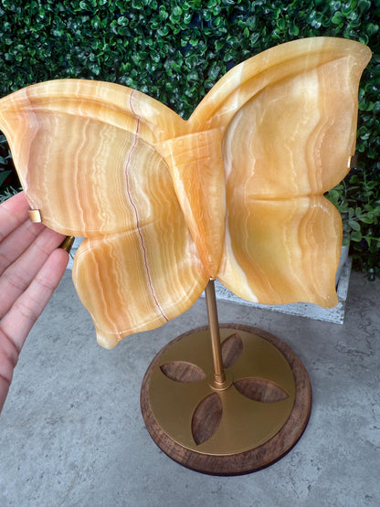 Calcite Butterfly Crystal Carving: Honey Orange Gemstone with Golden Stand