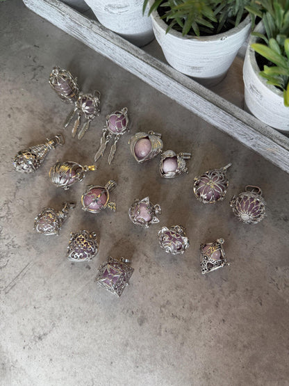 Kunzite Sphere Cage Pendant with Feather Charms