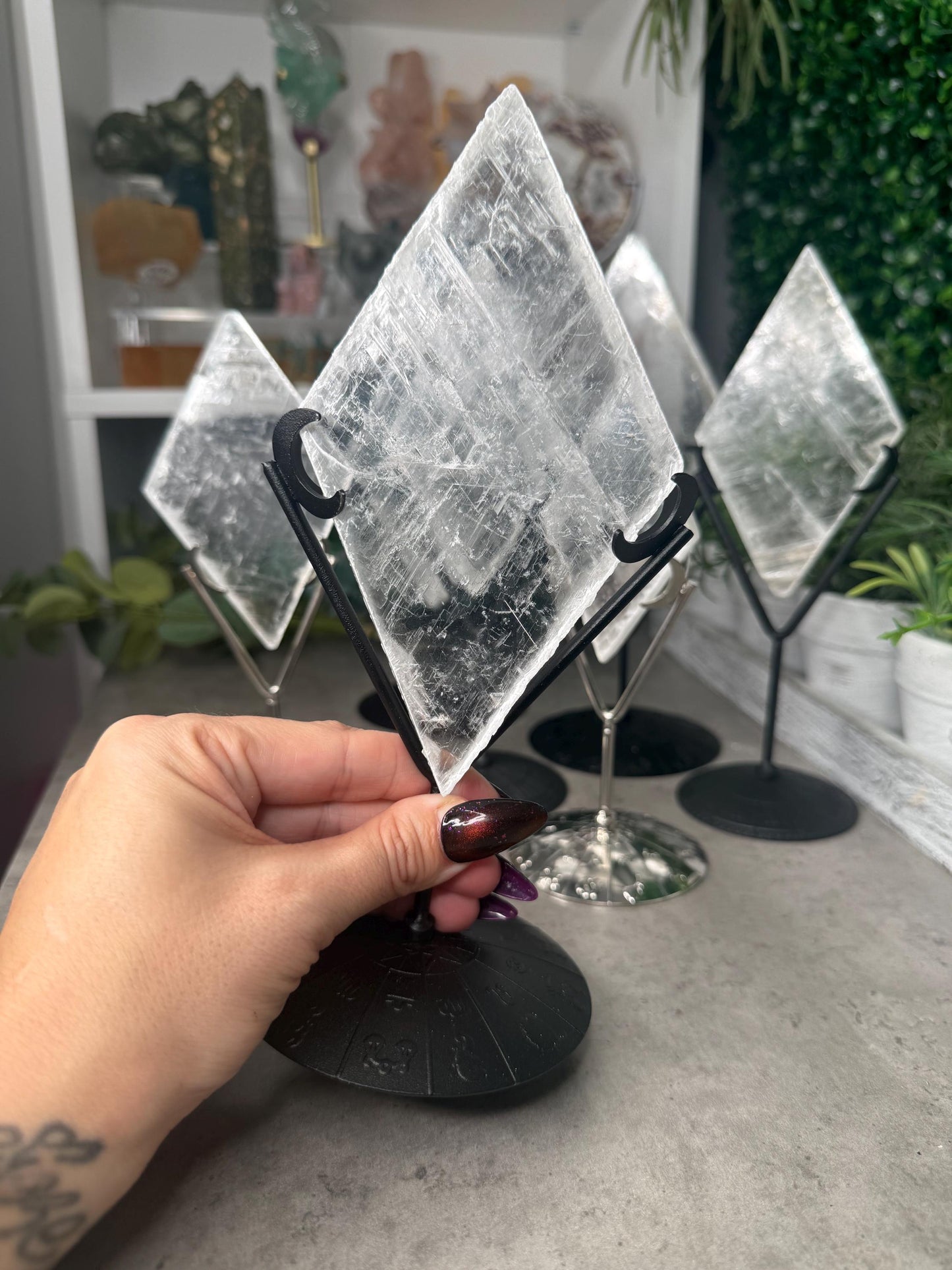 Selenite Rhombus Diamond Crystal Carving on Silver Stand