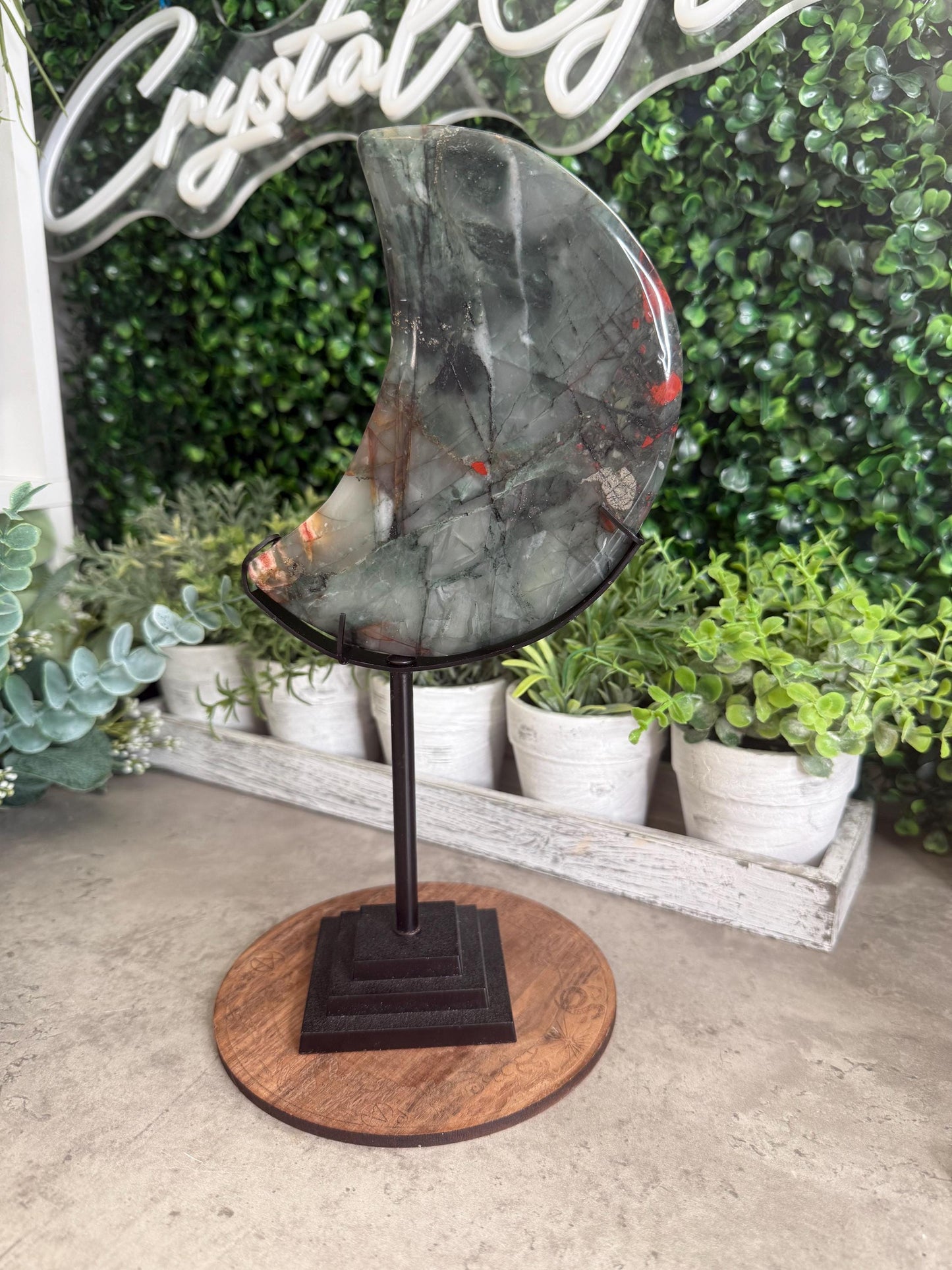 Large African Bloodstone Moon Crystal Carving with Black Stand