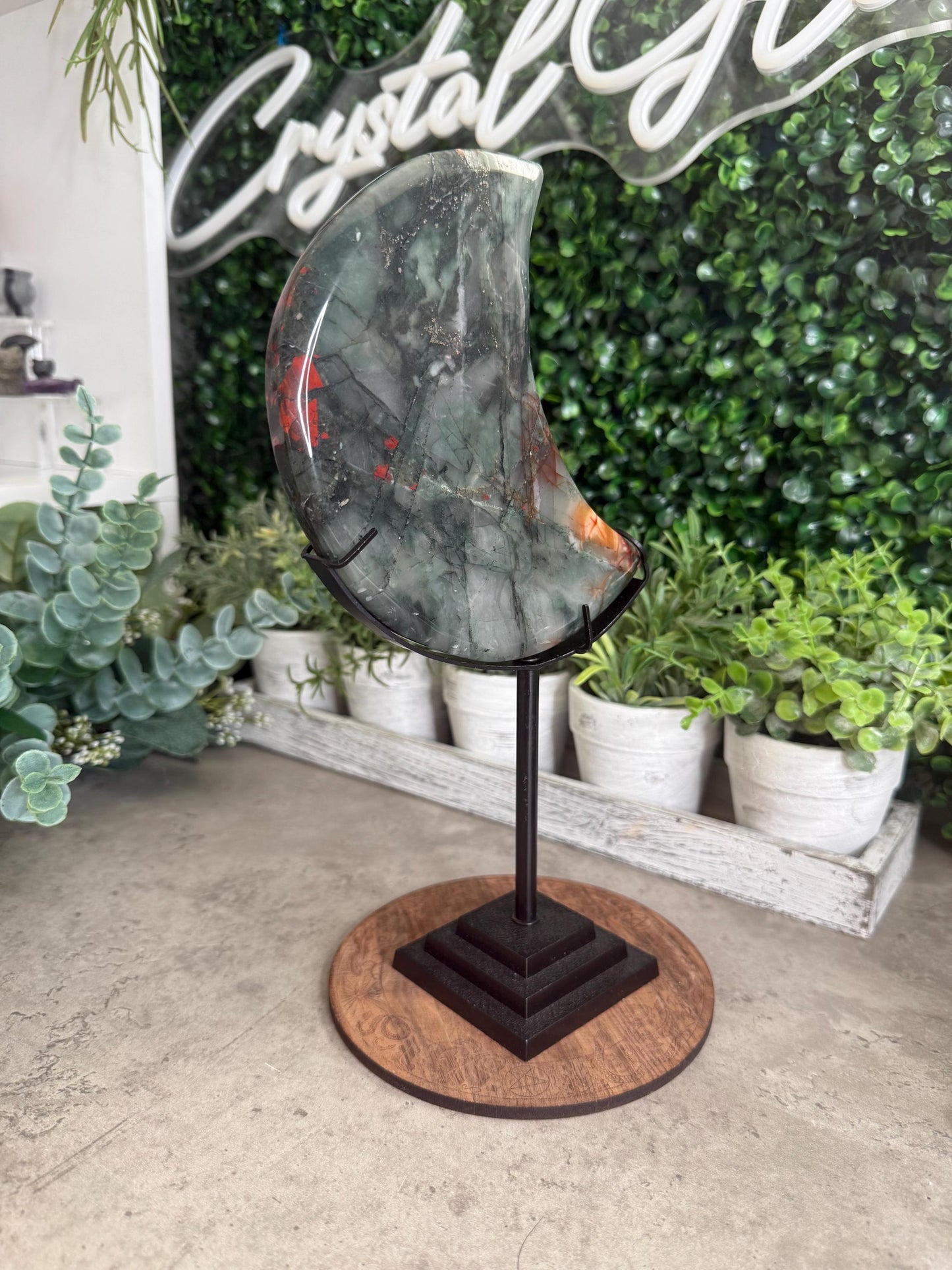 Large African Bloodstone Moon Crystal Carving with Black Stand