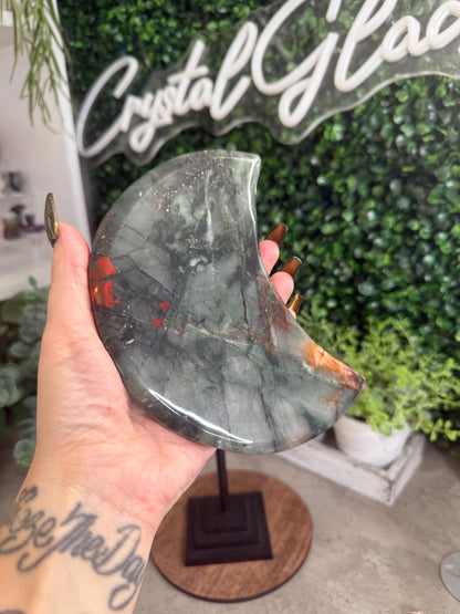 Large African Bloodstone Moon Crystal Carving with Black Stand